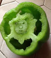 A smiley green pepper